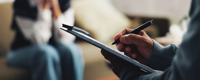 Writing, clipboard and counseling with hands of person for psychologist, mental health and