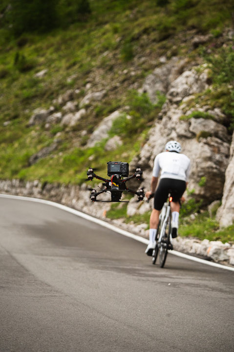 fpv drone following a cyclist