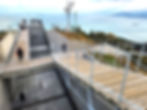 Elevated viewing platform and ramps with scenic views of the Seto Inland Sea and distant islands.