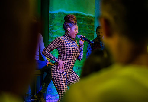 Adora Peak Singing Through Crowd.JPG