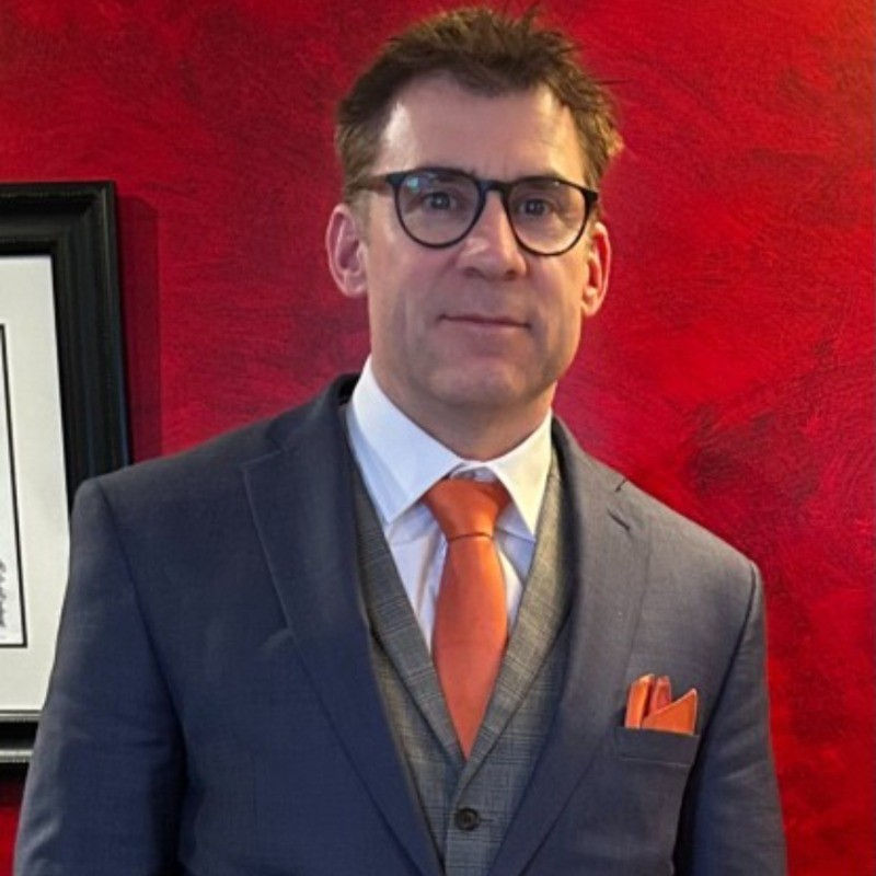 Middle age man in suit headshot