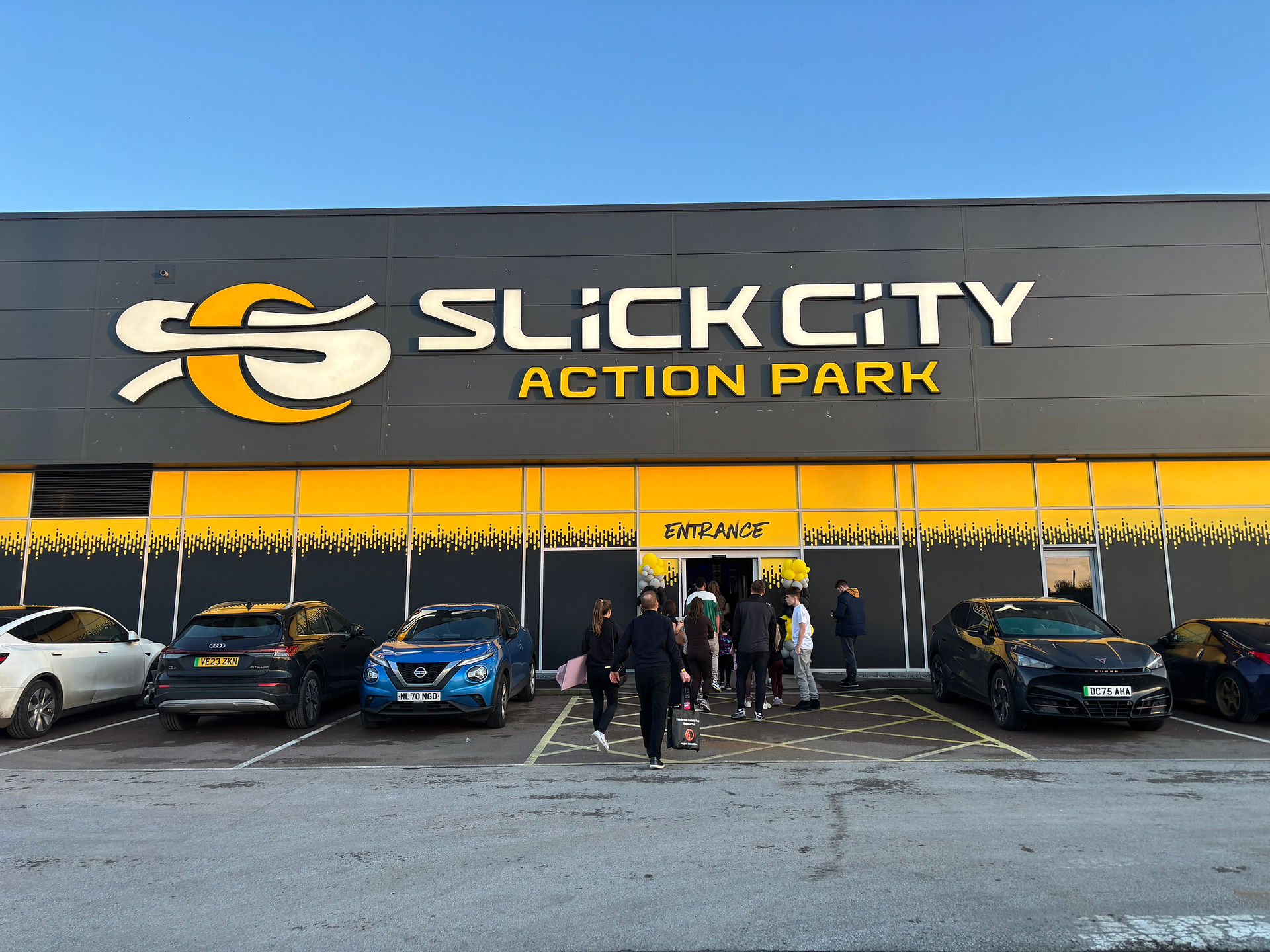 Entrance of Slick City Nottingham with black and yellow logo