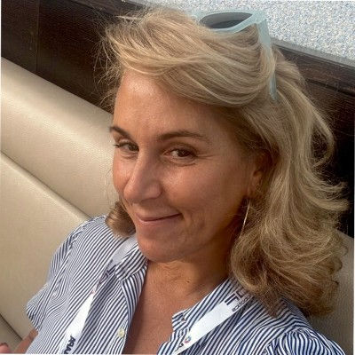 Middle aged woman smiling at camera