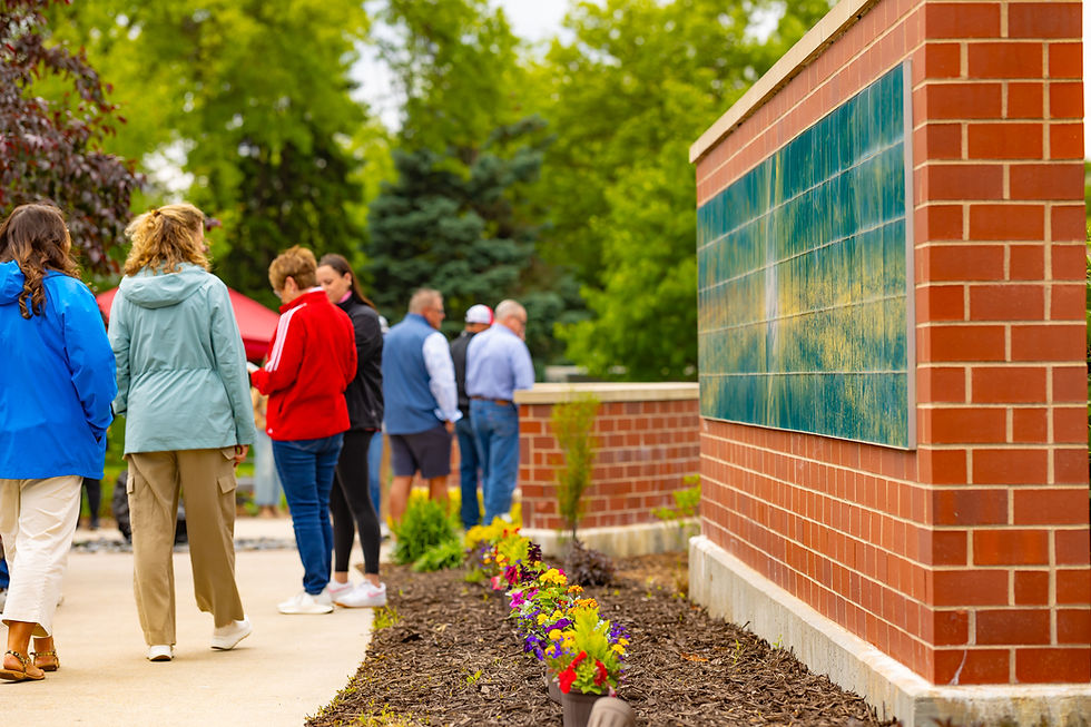 the brick memorial wall and mural wall
