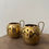 Thumbnail: Vintage Brass Round Cut Out Candle Holders with Handles