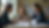 Eye-level view of a school counselor reviewing documents with a parent