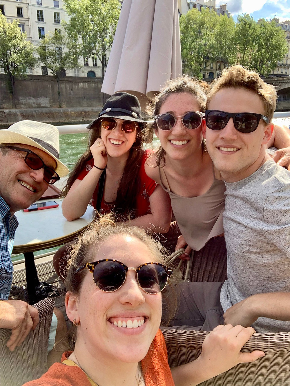 George with my family in Paris drinking on the Seine in 2019.