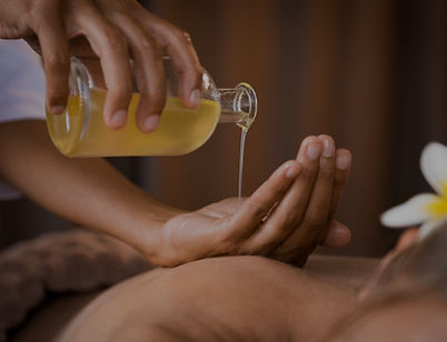 Pouring Massage Oil_edited.jpg