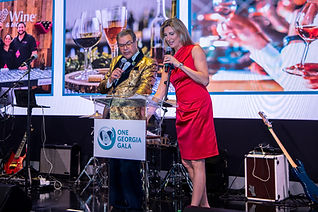Auctioneer George Franco with Cheryl Preheim of 11Alive at Georgia Trauma Foundation gala
