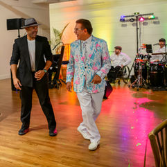 Auctioneer George Franco dancing