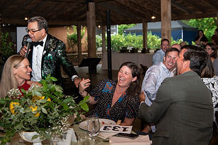 Auctioneer George Franco with bidders at Terra School Gala