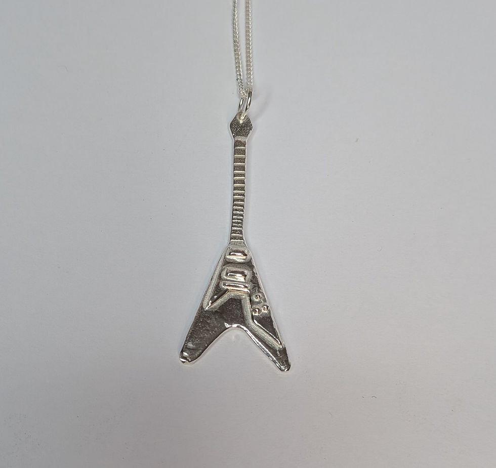 Thumbnail: Silver Guitar  pendant. Thunderbird, Flying V or SG.