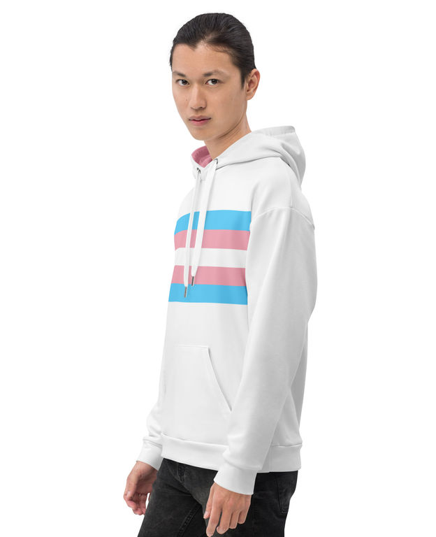 Model wearing a trans pride hoodie, showcasing blue, pink, and white transgender pride stripes.