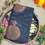 Thumbnail: Floral Designer Black with Magenta Soft Silk Saree with Blouse folded view