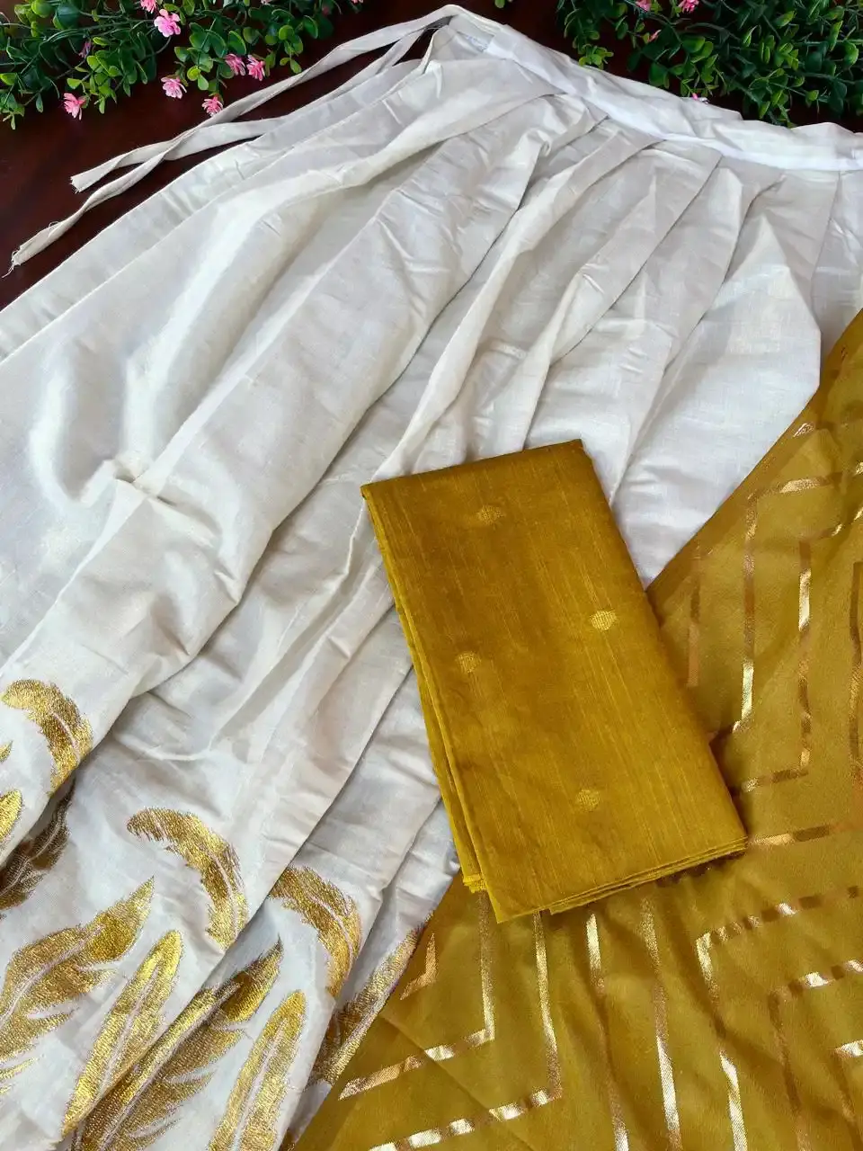 Thumbnail: Feather Embroidery Kasavu Tissue Dhavani Set closeup view