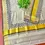 Thumbnail: Floral Temple Coffee Bean Border Kasavu Tissue Setmundu main view