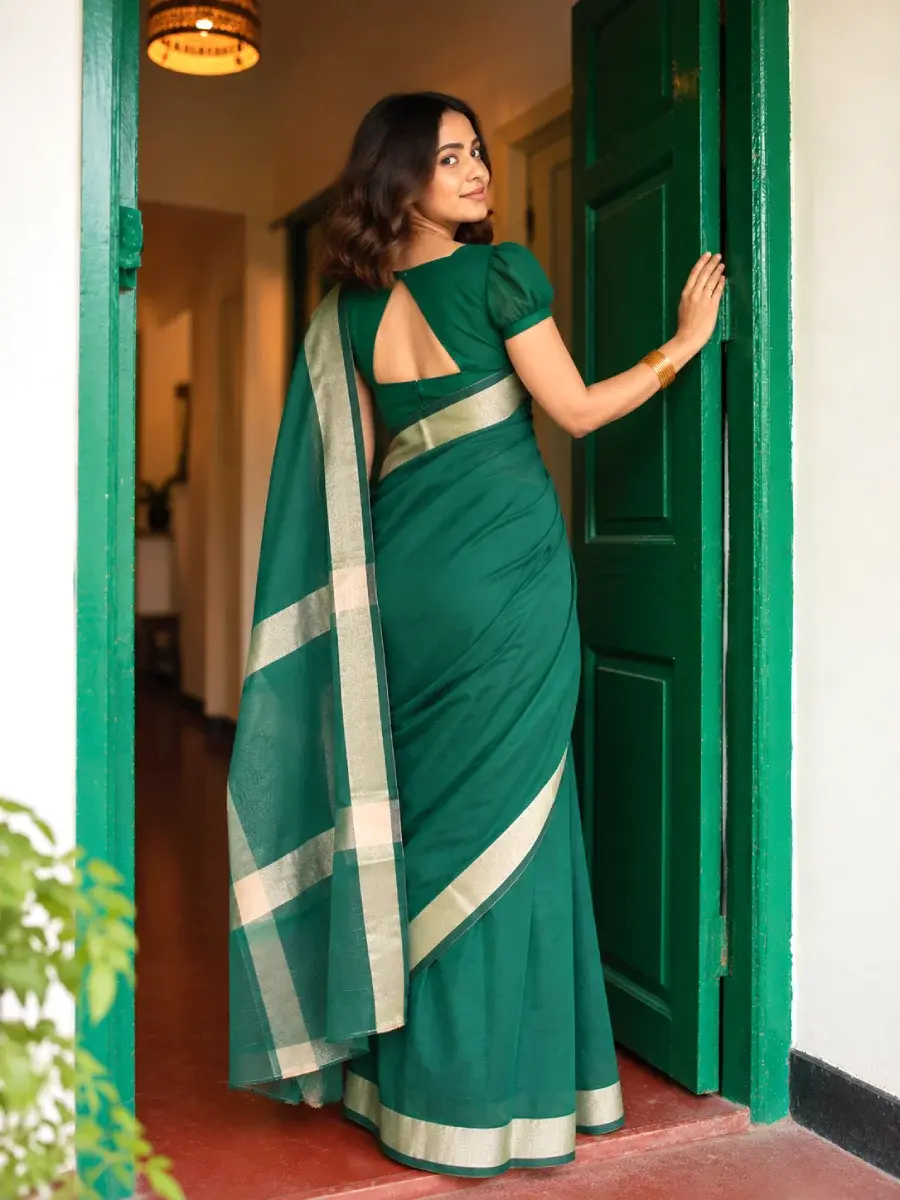 Thumbnail: Bottle Green Plain Cotton Saree with Zari Border bak side view