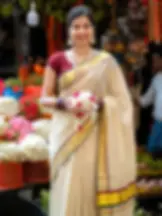 Handloom Kasavu Saree with Stripes and Maroon & Green Border closeup view