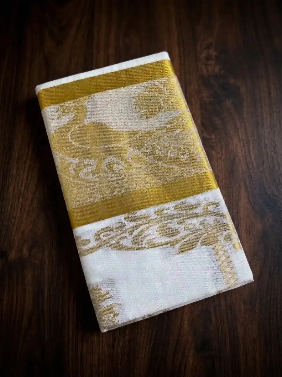 Thumbnail: Premium Radha Krishna Jacquard Balaramapuram Tissue Saree folded view