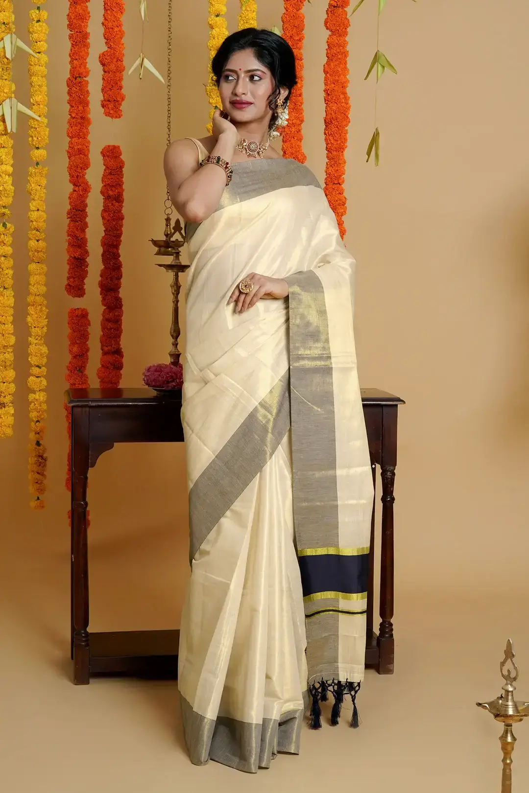 Classy Black Tussel Tissue Kasavu Saree main view