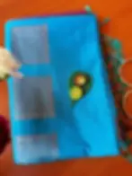 Thumbnail: Ciel Blue Chathura Kanchipuram Soft Silk Saree folded view