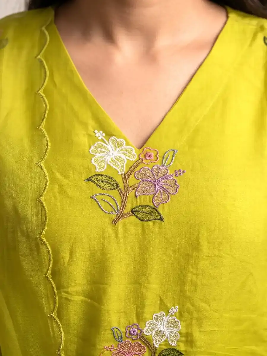 Thumbnail: Lime Green Chandheri Silk Kurta Set with Floral Embroidery & Scalloped Dupatta closeup neck view