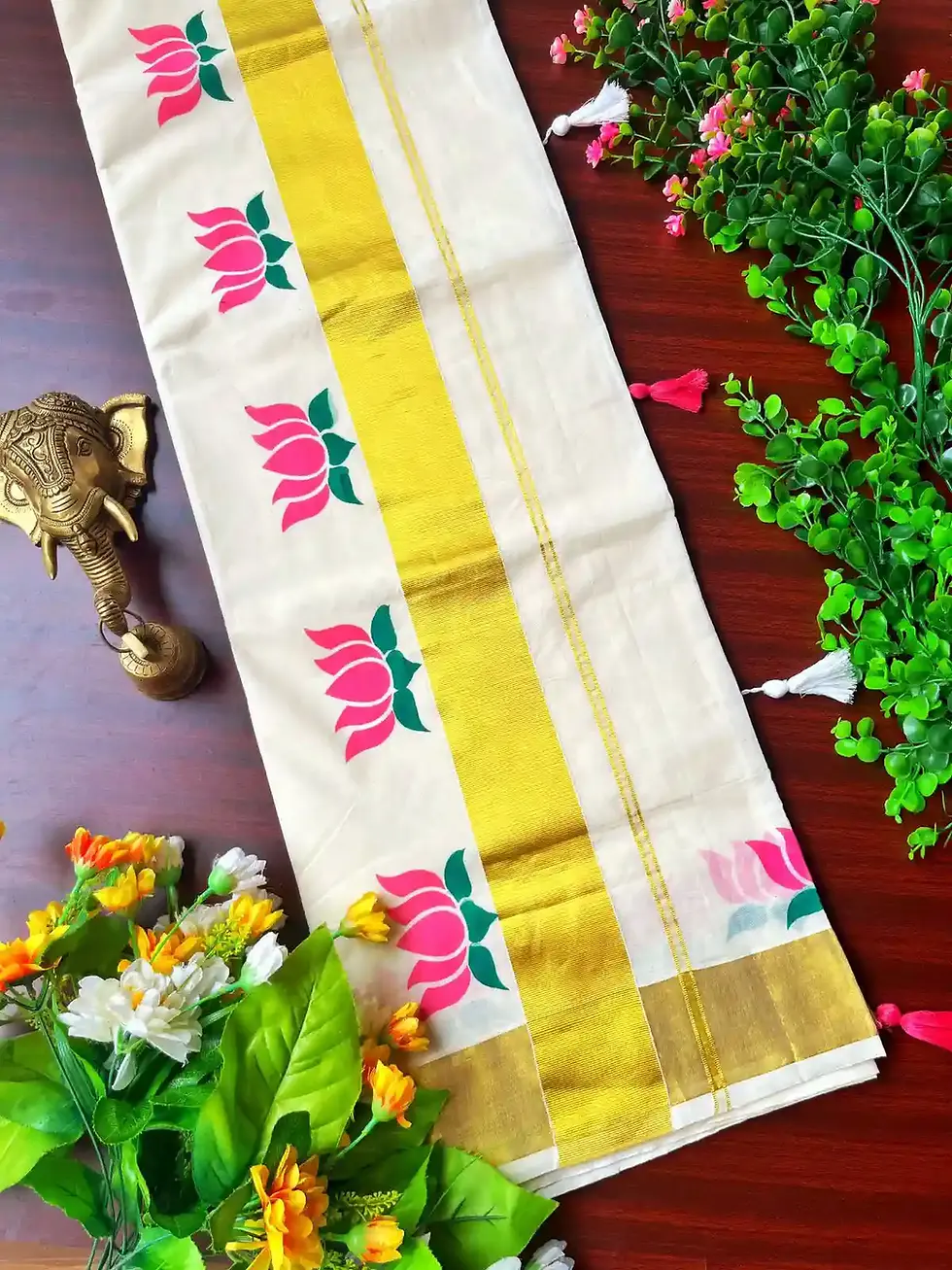 Thumbnail: Pink Lotus Kasavu Cotton Kerala Saree with Tussel top view