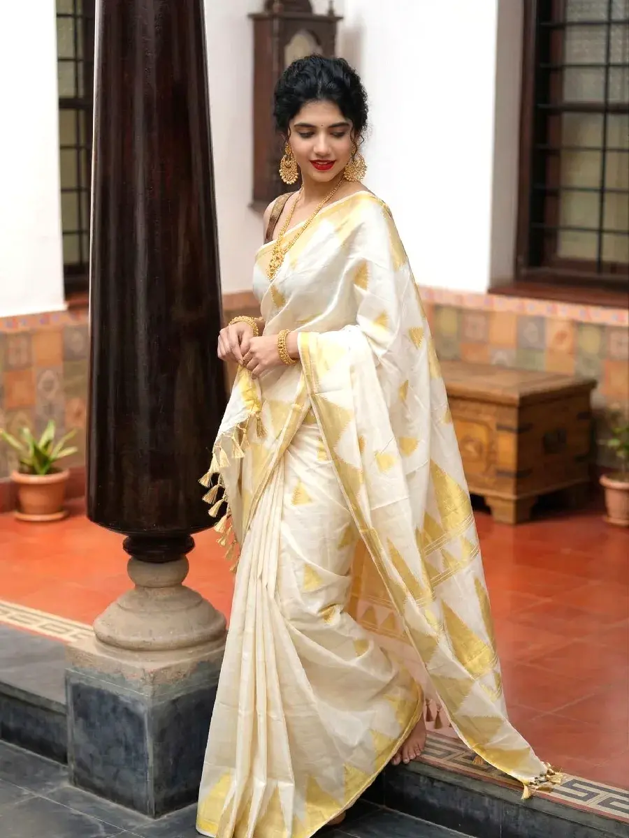 Premium Temple Zari Tissue Kasavu Saree with Tussel standing view