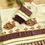 Thumbnail: Antique Mural Design Coffee Bean Tussel Tissue Kasavu Saree