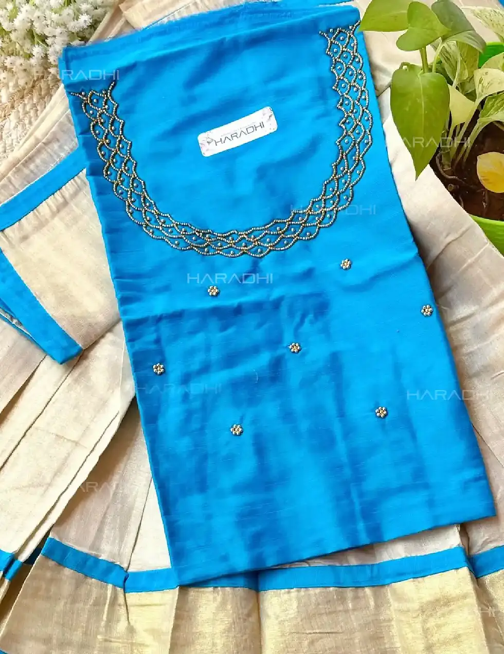 Aqua Blue Tissue Stone Work Dhavani Set with Blouse closeup view