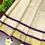 Thumbnail: Purple Stone & Mirror Work Kasavu Tissue Dhavani Set skirt piping view