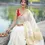 Thumbnail: Peacock Motif Jacquard Golden  Kasavu Saree With Blouse model sitting view