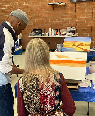 Chef Mccoy teaching in visual arts.JPG