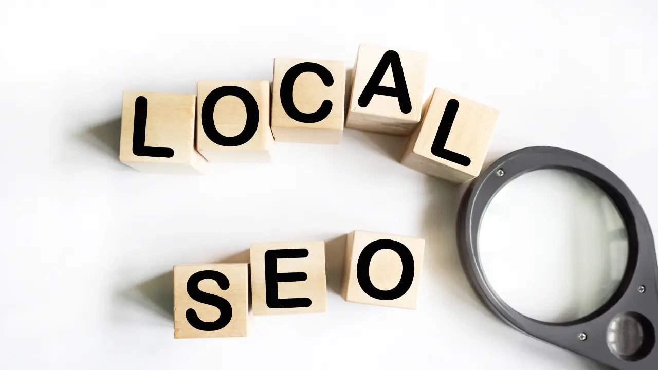 The words 'Local SEO' spelled out using wooden blocks