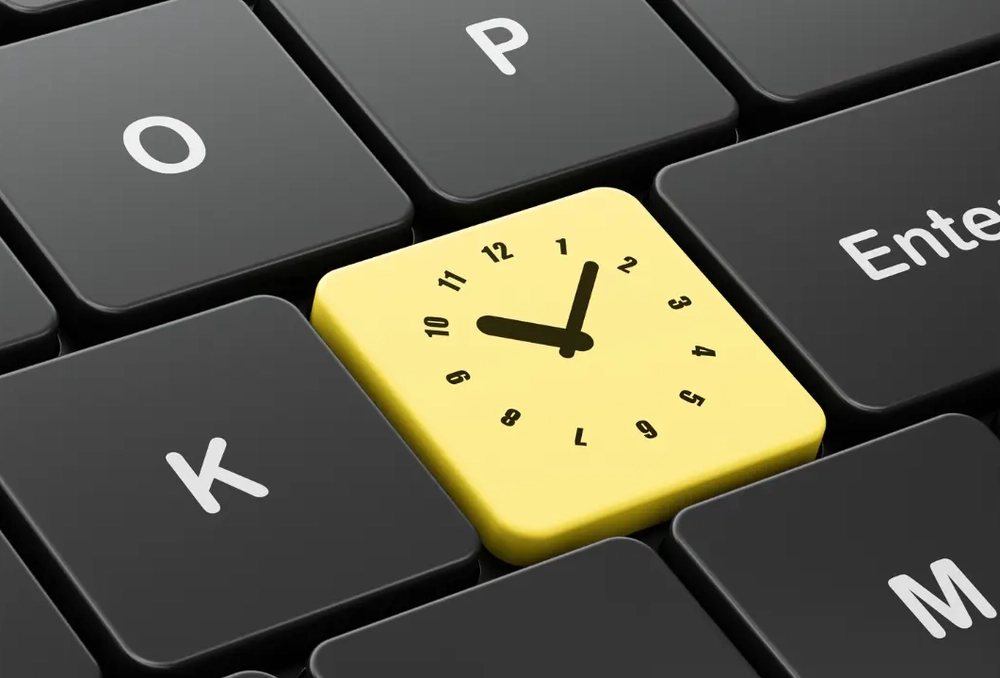 An image of a clock on a keyboard button