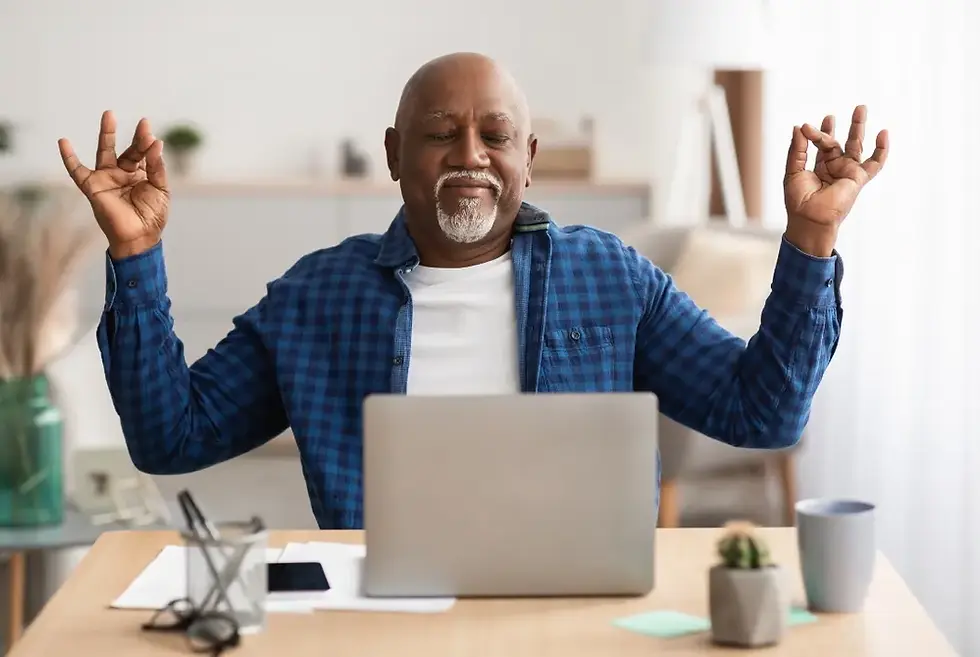 An old man using his laptop