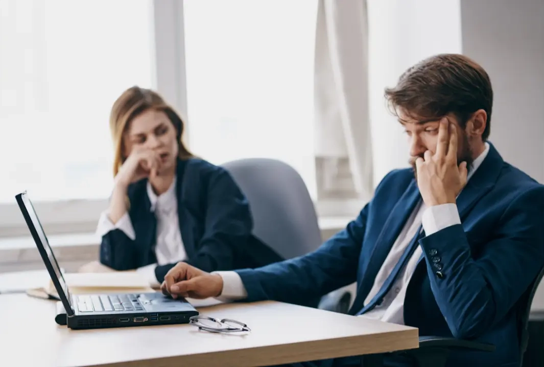 Two people looking unhappy with their website's performance