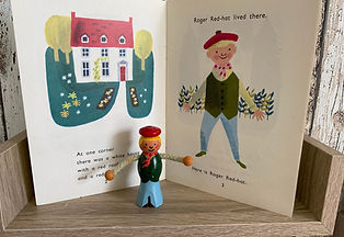 Roger Red-hat lives in the Village with Three Corners