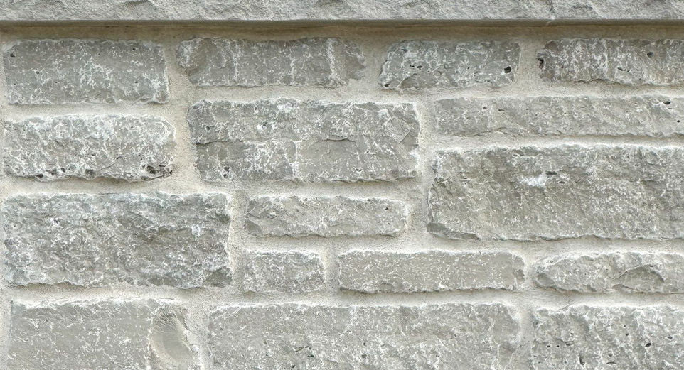 fdlstone, fond du lac stone, fond du lac stonegate, fond du lac splitface, oakfield stone company, natural stone veneer, natural stone veneers, white, gray, silver, machine cut veneer, natural stone, thin veneer, full stone veneer, building stone, custom home, stone wall, wisconsin, quarry