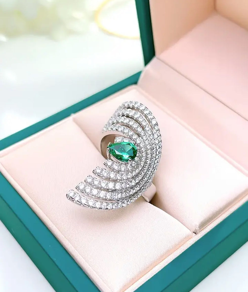 الصورة المصغرة: خاتم حلقات حجر اخضر 