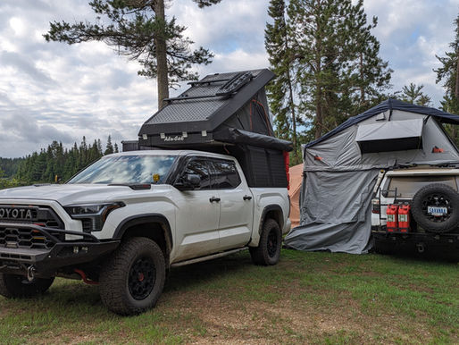 A Tundra and 4Runner with rooftop tents.
