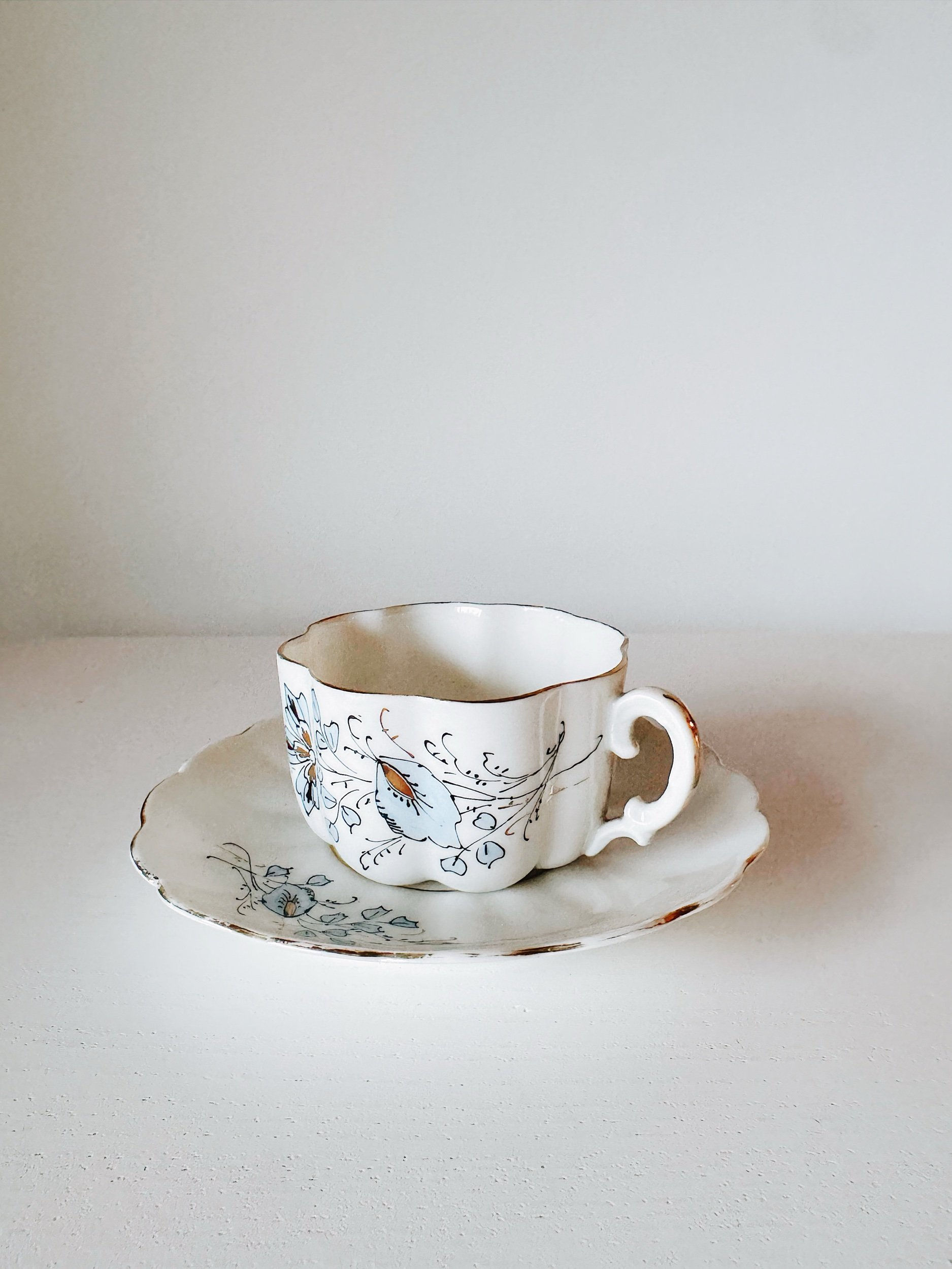 Antique Scalloped Porcelain Teacup & Saucer – Blue Floral & Gold Gilt
