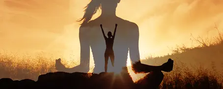 Woman meditating and standing with arms up