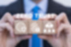 Businessman holding wooden cubes with icons and sees inscription_ ZERO TRUST. Concept of z