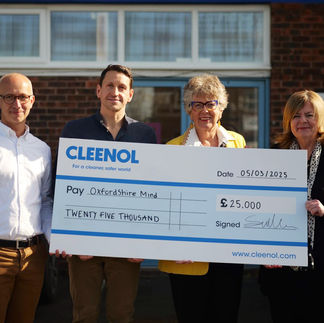 Cleenol team presents £25,000 cheque to charity