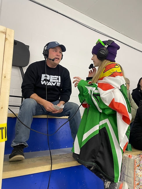 Nora Evans cheering on her team.jpeg