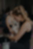 Photo of a participant holding a Golden Retriever at a puppy yoga session in Sydney