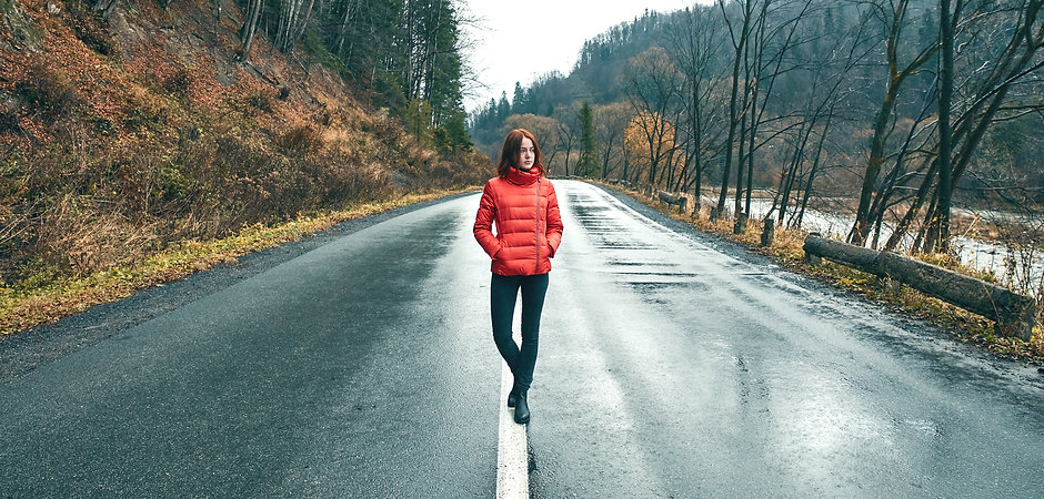Girl Walking in Empty Road