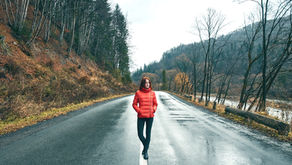 woman walking on road