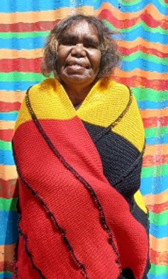Aboriginal lady wrapped in blanket